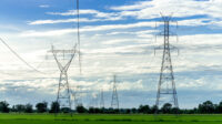 high-voltage-electric-pole-high-voltage-power-pole-blue-sky-1
